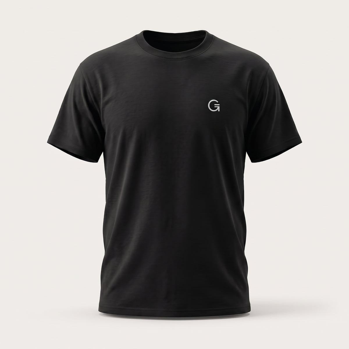 A ghost mannequin showing a black short-sleeve t-shirt with a white “Clobber & Gear” logo embroidered on the left chest, set against a gradated grey background.