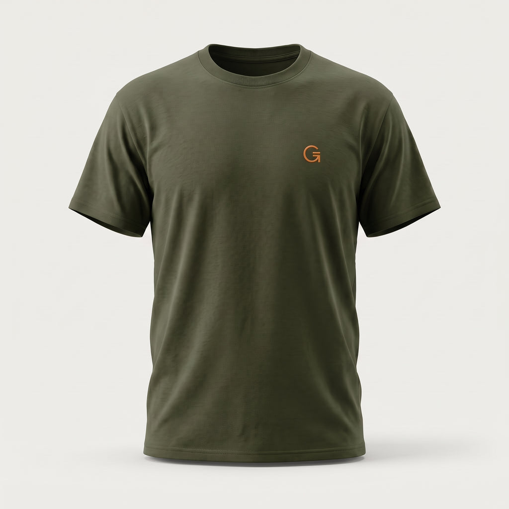 A ghost mannequin showing a military green short-sleeve t-shirt with a burnt orange “Clobber & Gear” logo embroidered on the left chest, set against a plain light grey background.