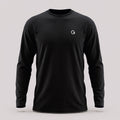A black crewneck long-sleeve t-shirt with a white ”Clobber & Gear” logo embroidered on the left chest, displayed against a plain light grey background.